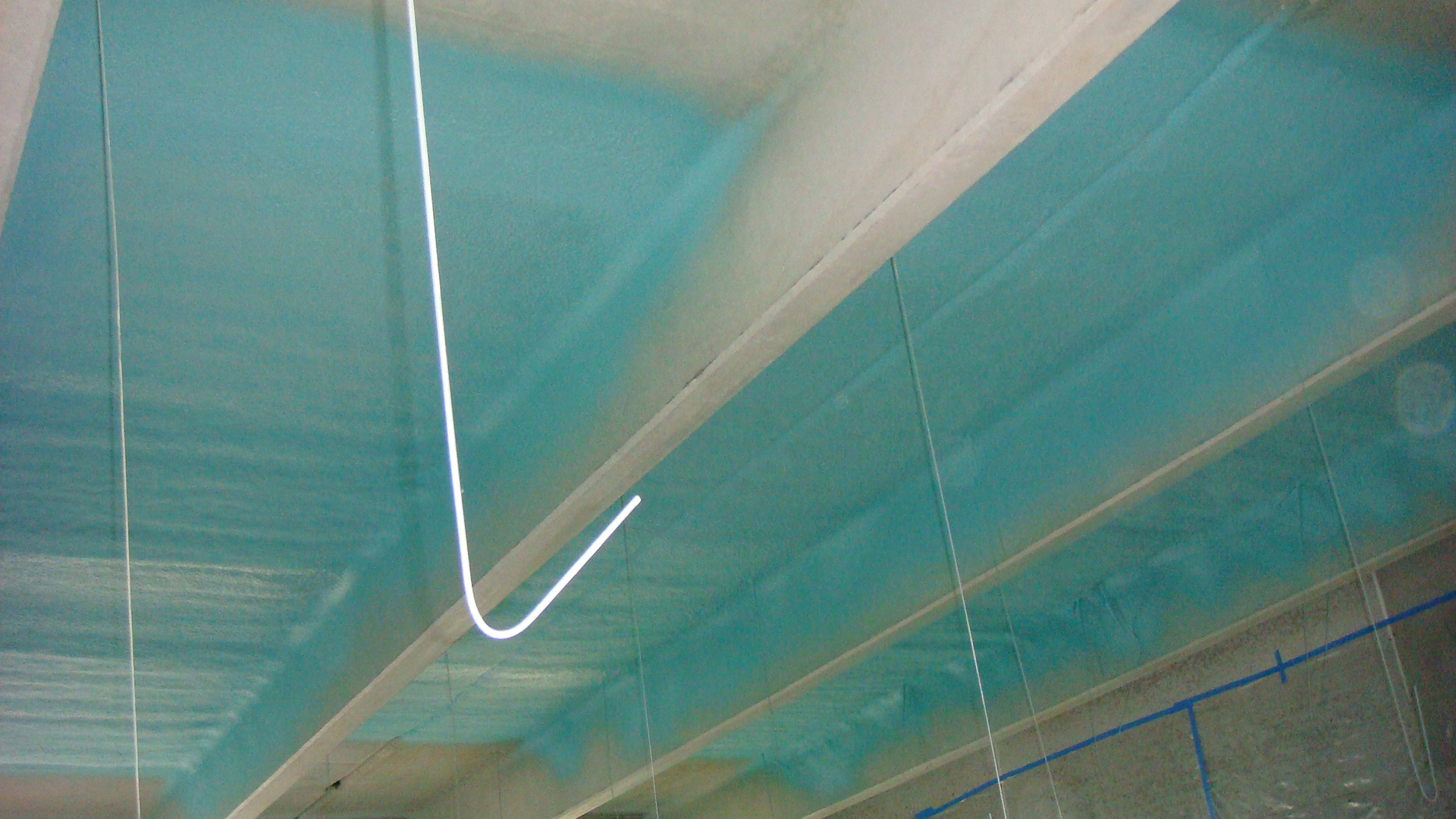 Industrial polyurea coating application in progress